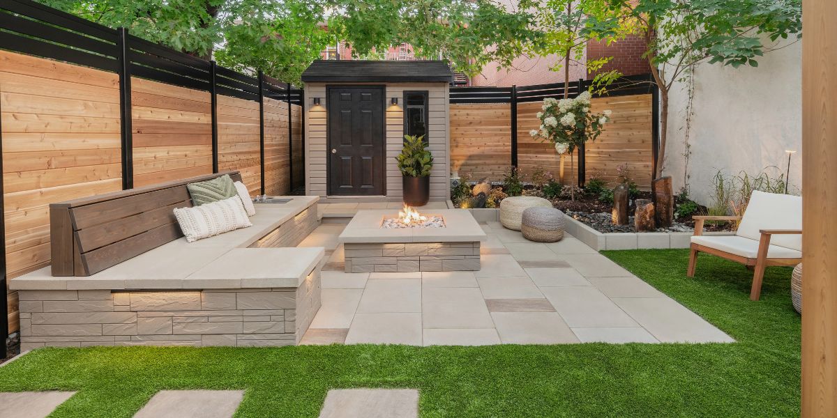 Small backyard with thoughtfully designed landscaping, patio, and garden features maximizing outdoor space | How to Design a Small Backyard